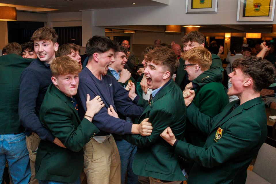 Members of Rory McIlroy's Holywood Golf Club celebrating his US Masters win.