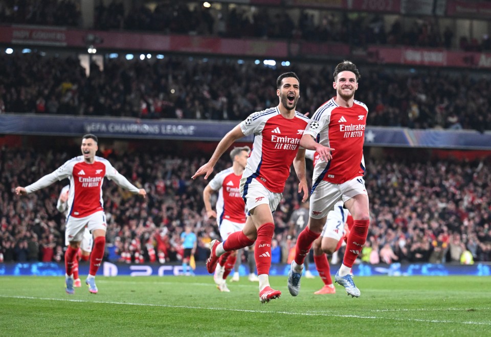 Mikel Merino and Declan Rice celebrating a goal.
