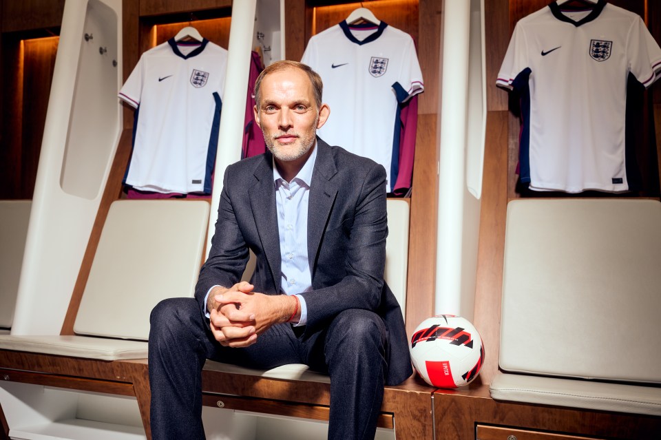 Thomas Tuchel, new England manager, sitting in a locker room.