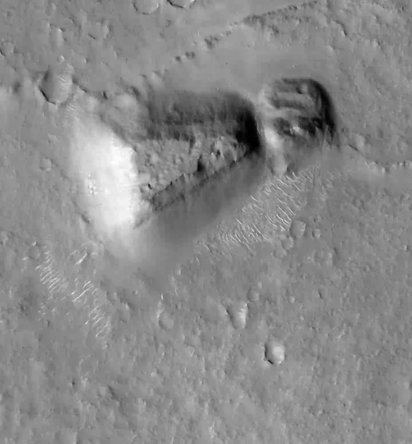 What do you think, man-made or naturally occurring? (NASA/JPL-Caltech/UArizona)