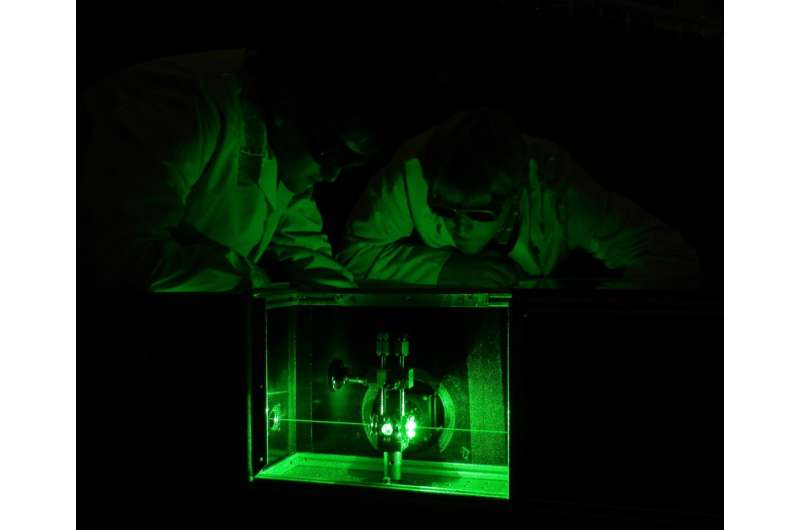 New experiment halves weight limit of elusive neutrinos
