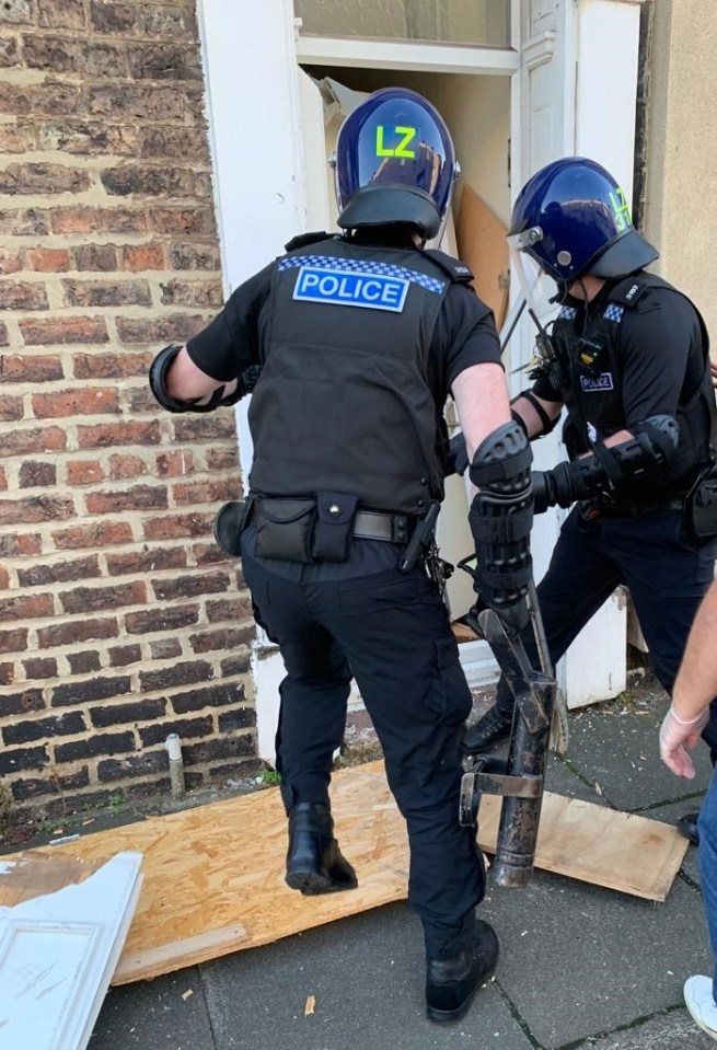 Seized drugs and phone in plastic bags.