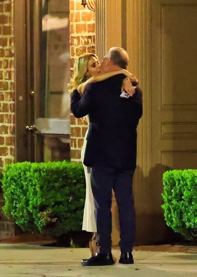 Paul Kemsley and Shana Wall kissing.