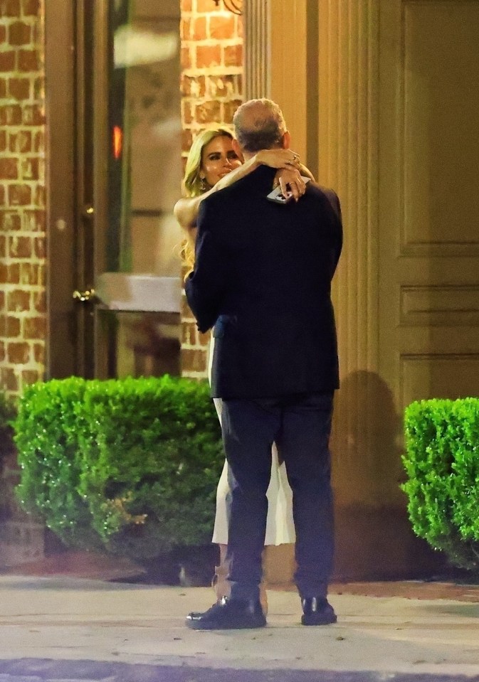 Paul Kemsley and Shana Wall embracing after dinner.