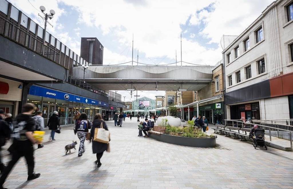 people walking outside merseyway shopping centre
