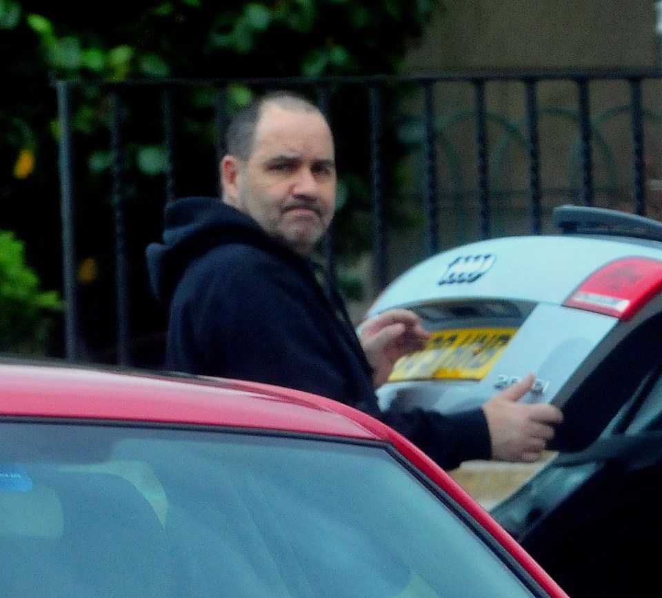 Jamie Daniel outside his home in Glasgow.