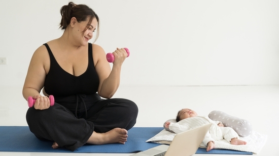 Juggling between child and workouts may be overwhelming. (Shutterstock)