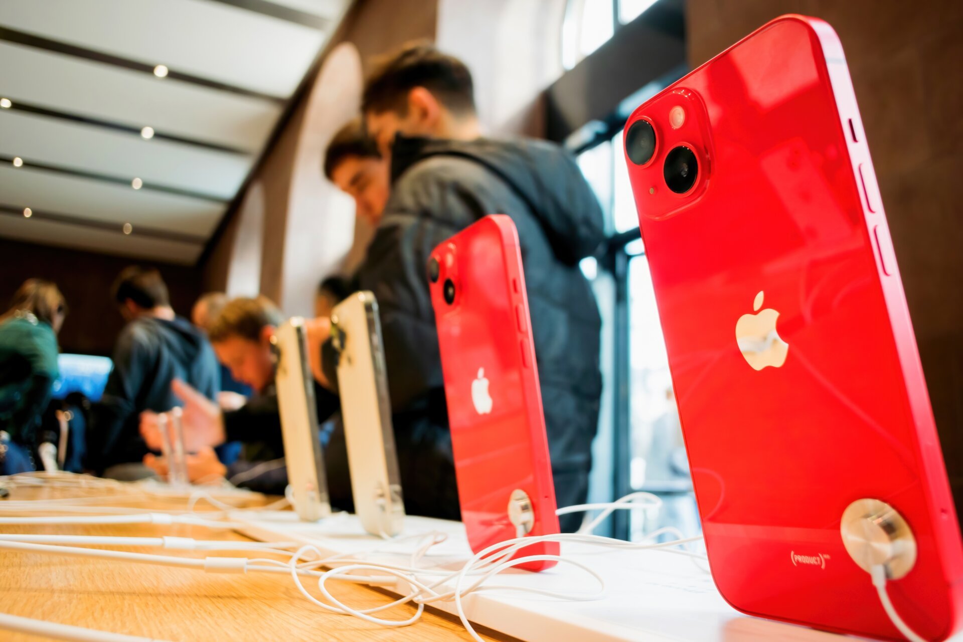 A PRODUCT(RED) iPhone 14 at an Apple Store
