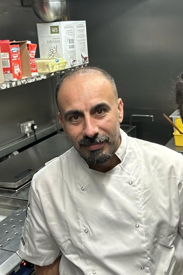 Headshot of Miraz Yolcu, managing director of San Marino restaurant.