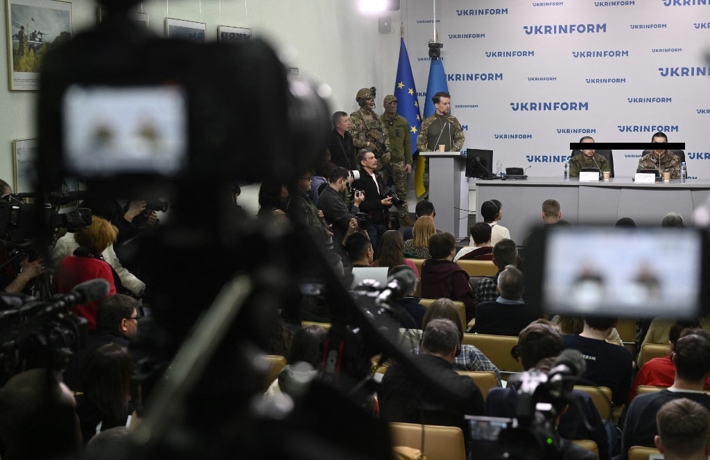 The two captured Chinese prisoners of war spoke to the media, answering questions in Mandarin