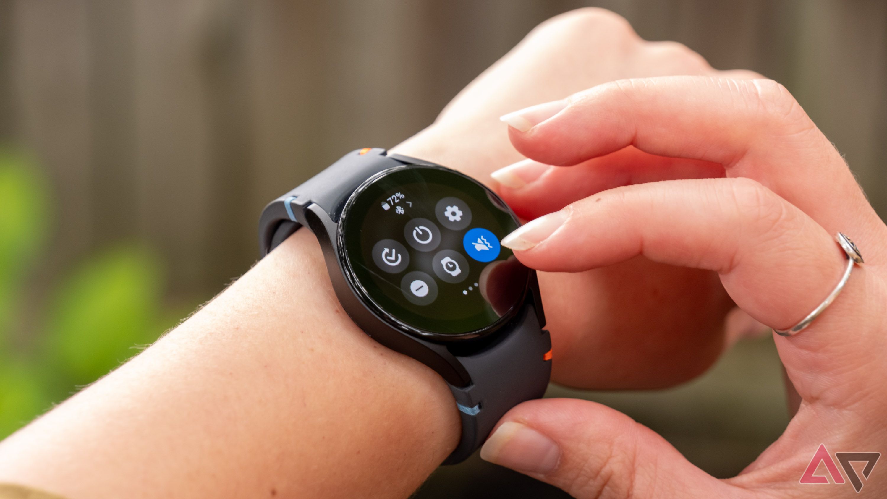 The Samsung Galaxy Watch FE showing its quick settings panel.
