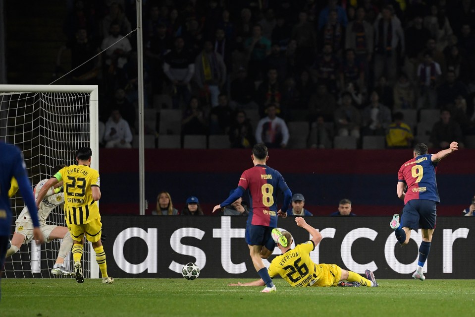 Lewandowski scored two second-half goals to help Barcelona dismantle Dortmund 4-0