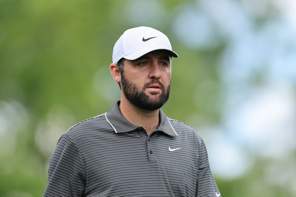 Scottie Scheffler walking at the Masters Tournament.