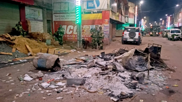 Security personnel keep a vigil at an area amid protests