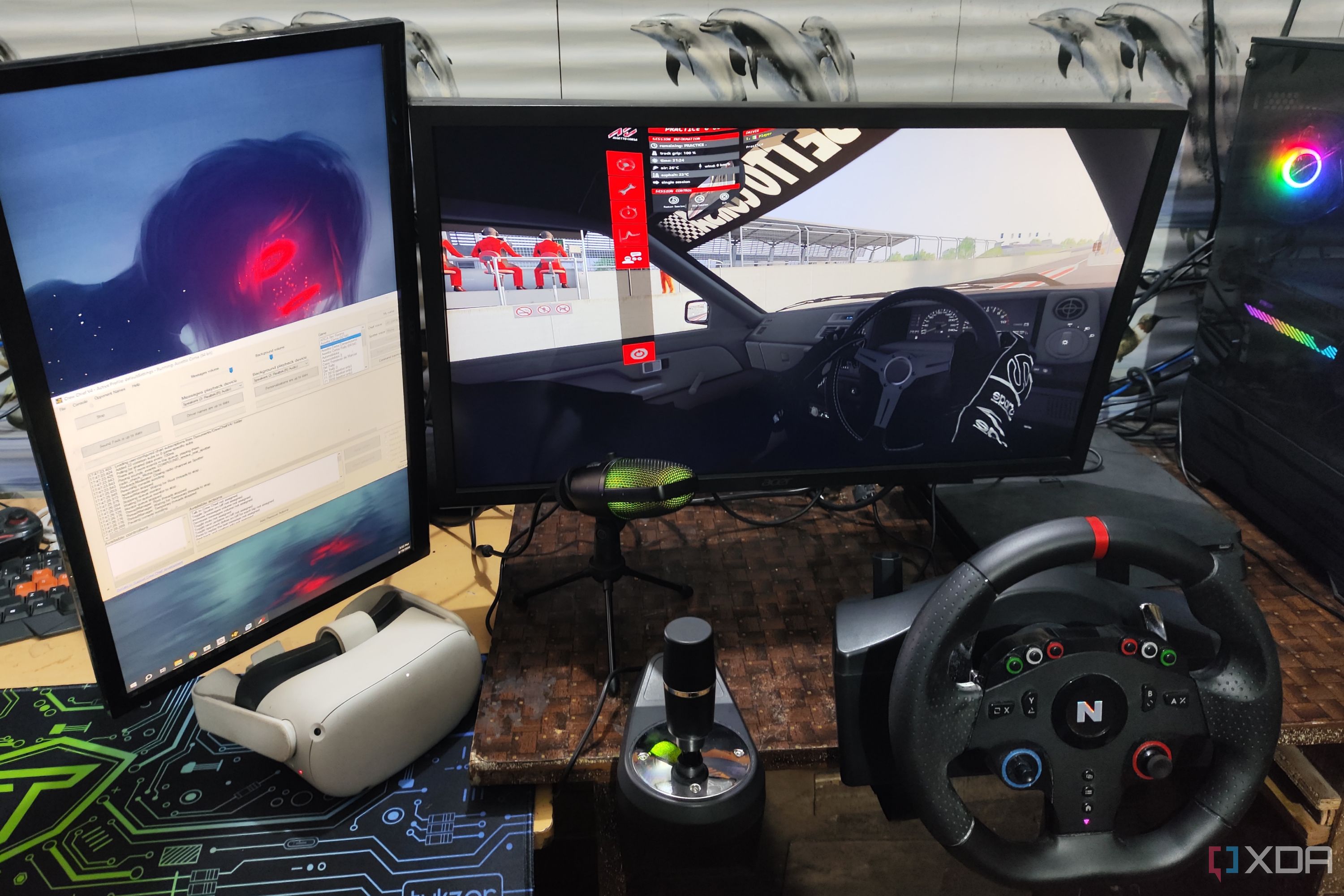 Assetto Corsa running in VR mode, with a Nitho Pro Driving Wheel and Meta Quest 2 lying next to the monitors