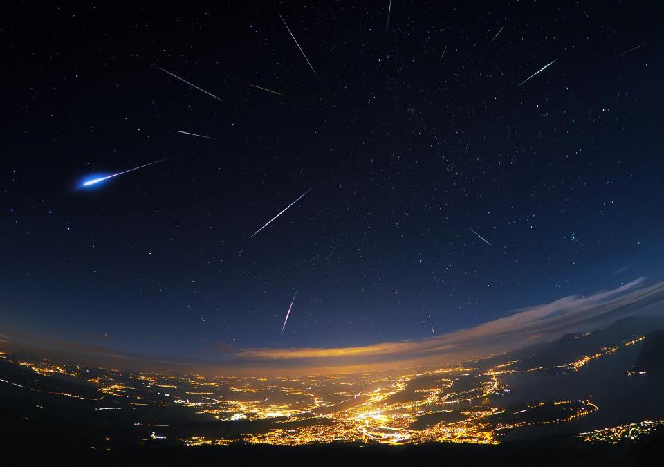 Perseid meteor shower over Lucerne at night.