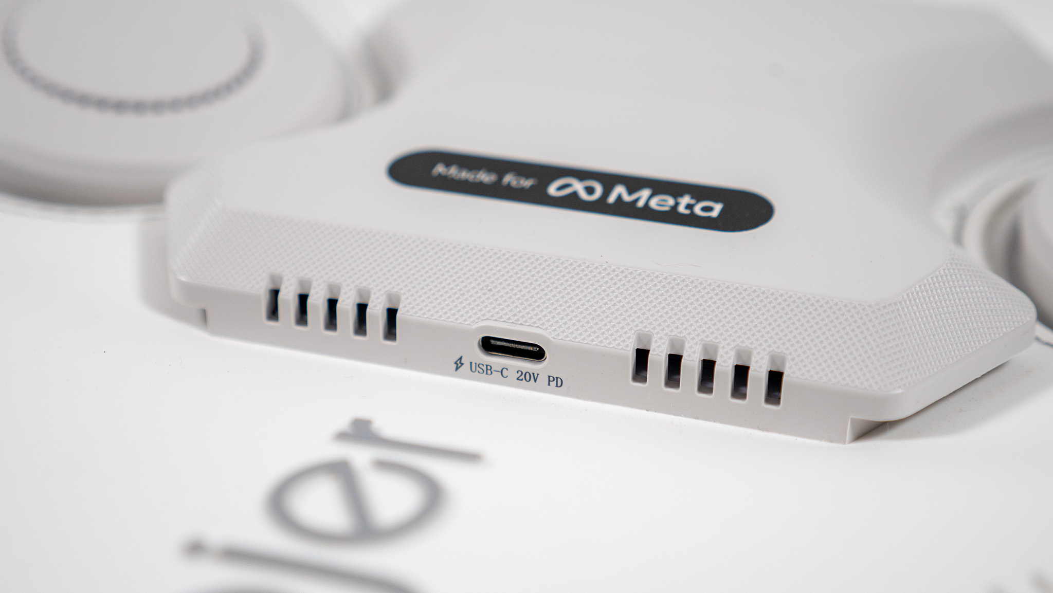 A close-up look at the battery pack on the back of the Woojer Haptic Vest 3