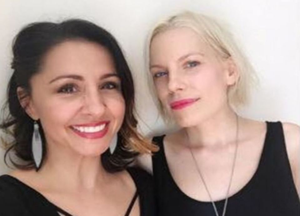 Photo of two women, one with dark hair and one with blonde hair.
