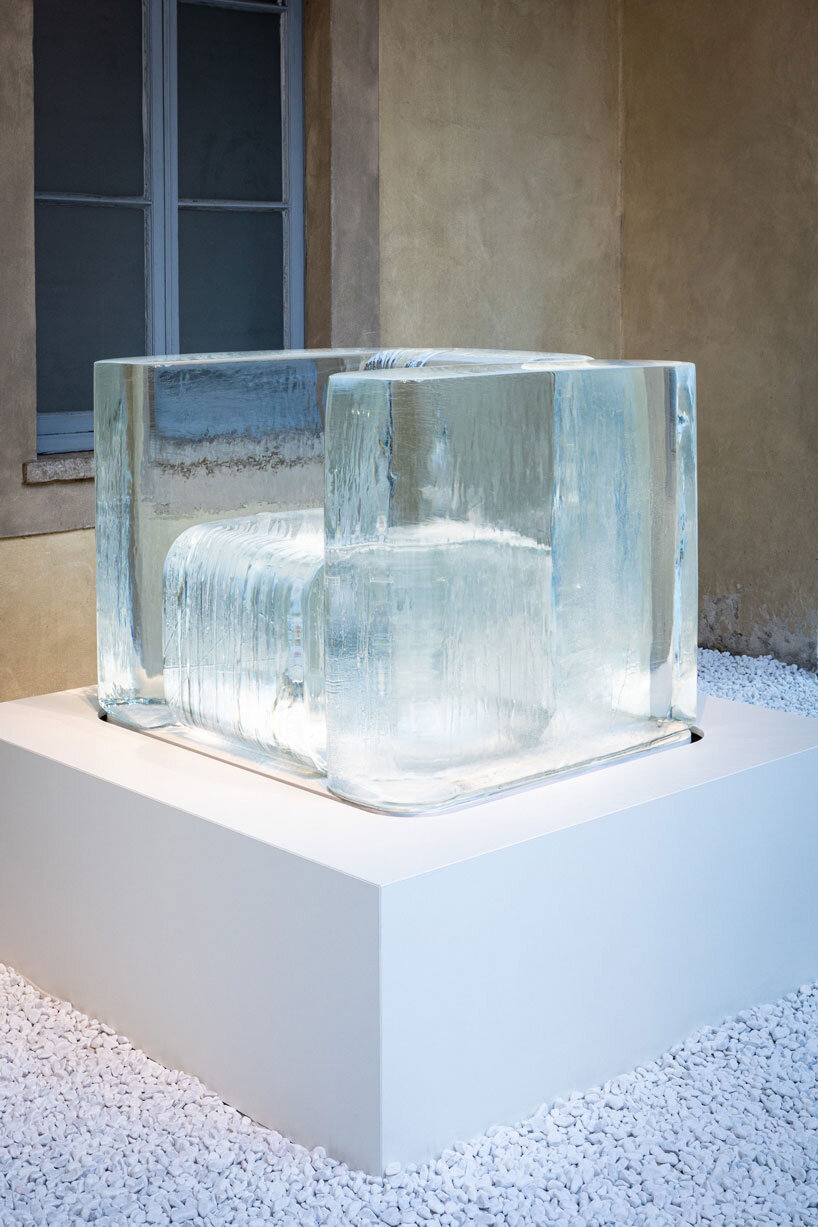 tokujin yoshioka's sculptural chairs made from frozen water melt during milan design week