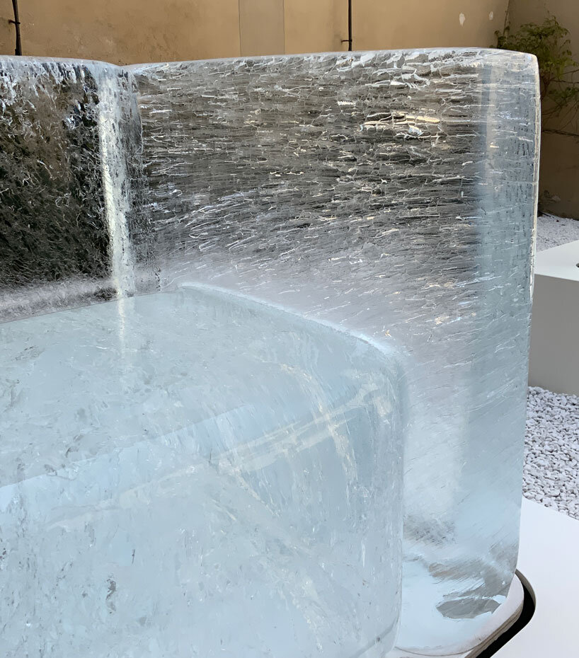 tokujin yoshioka's sculptural chairs made from frozen water melt during milan design week