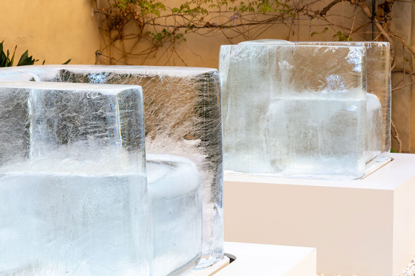 tokujin yoshioka's sculptural chairs made from frozen water melt during milan design week