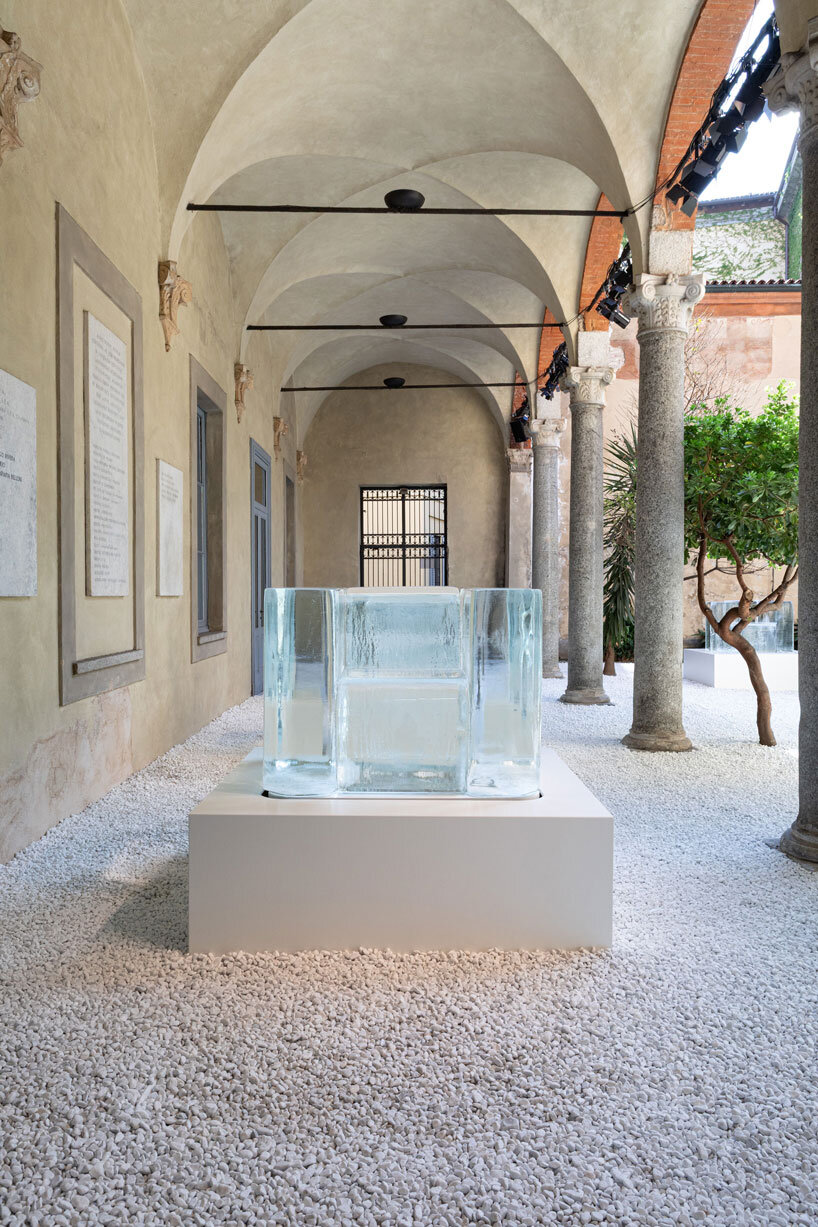 tokujin yoshioka's sculptural chairs made from frozen water melt during milan design week