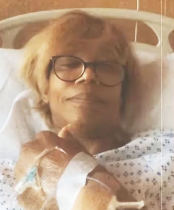 Trisha Goddard in a hospital bed.