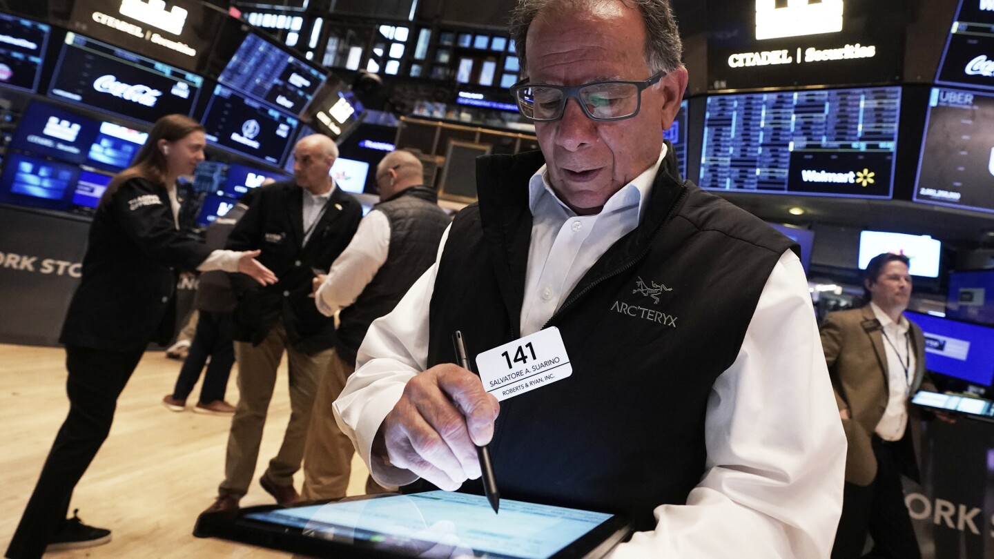 Wall Street and the dollar tumble as investors retreat further from US