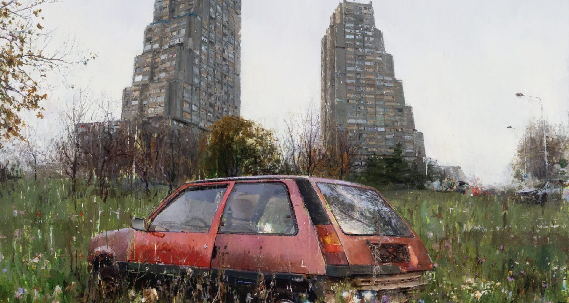 an oil painting of an old red car in a grassy meadow with two large brutalist high-rise buildings in the background
