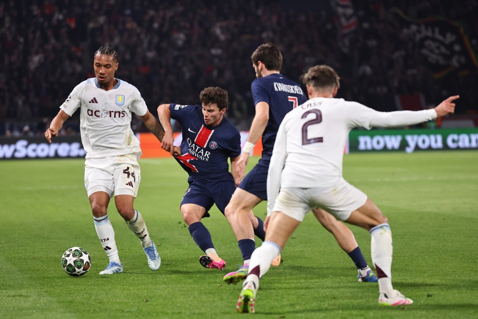 Soccer players in action during a UEFA Champions League match.