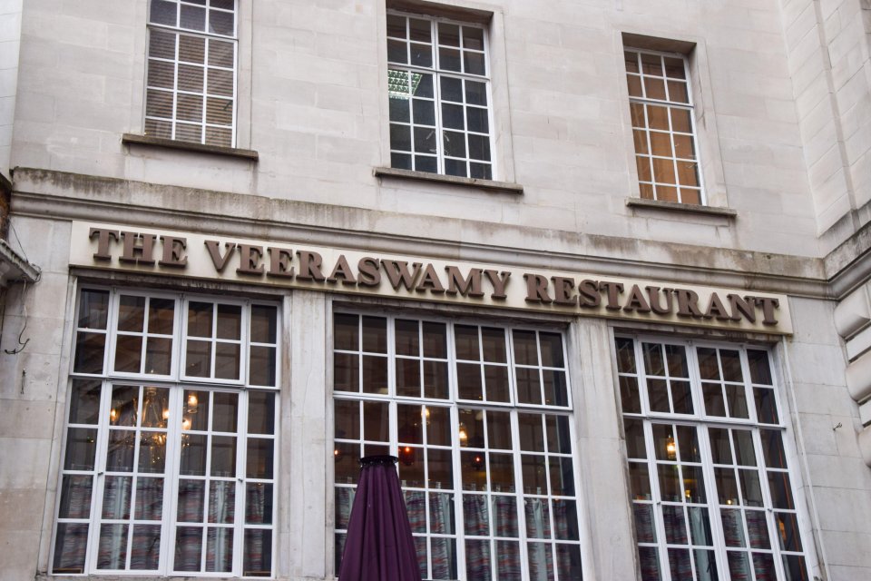 The Veeraswamy Restaurant sign on a building.