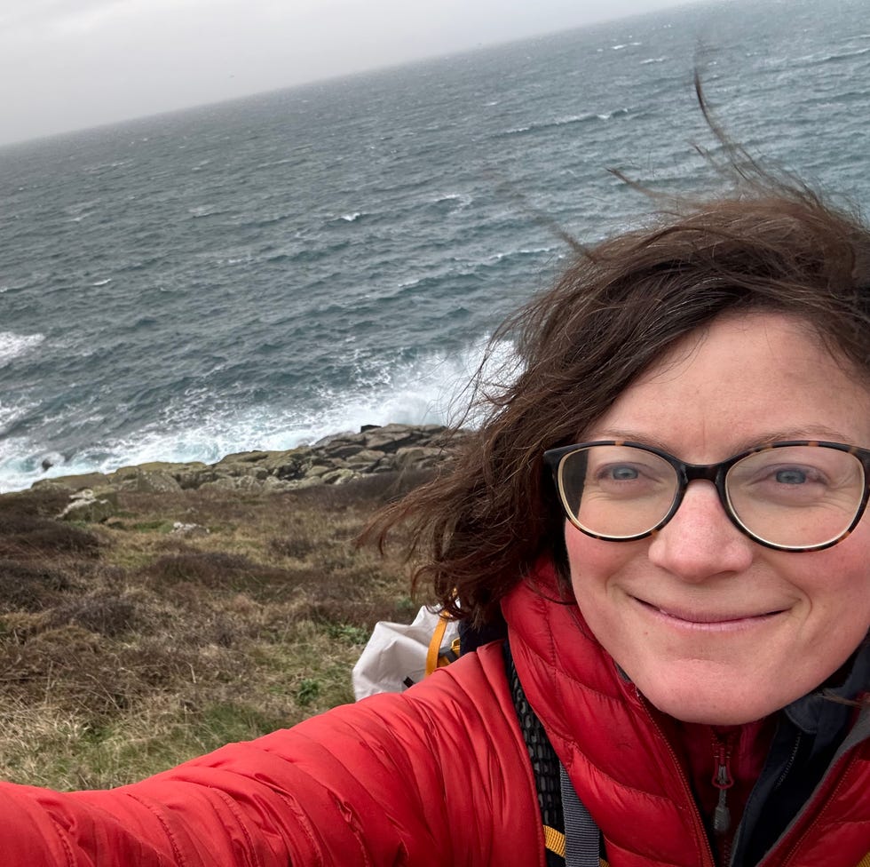 lady taking a selfie by the coast