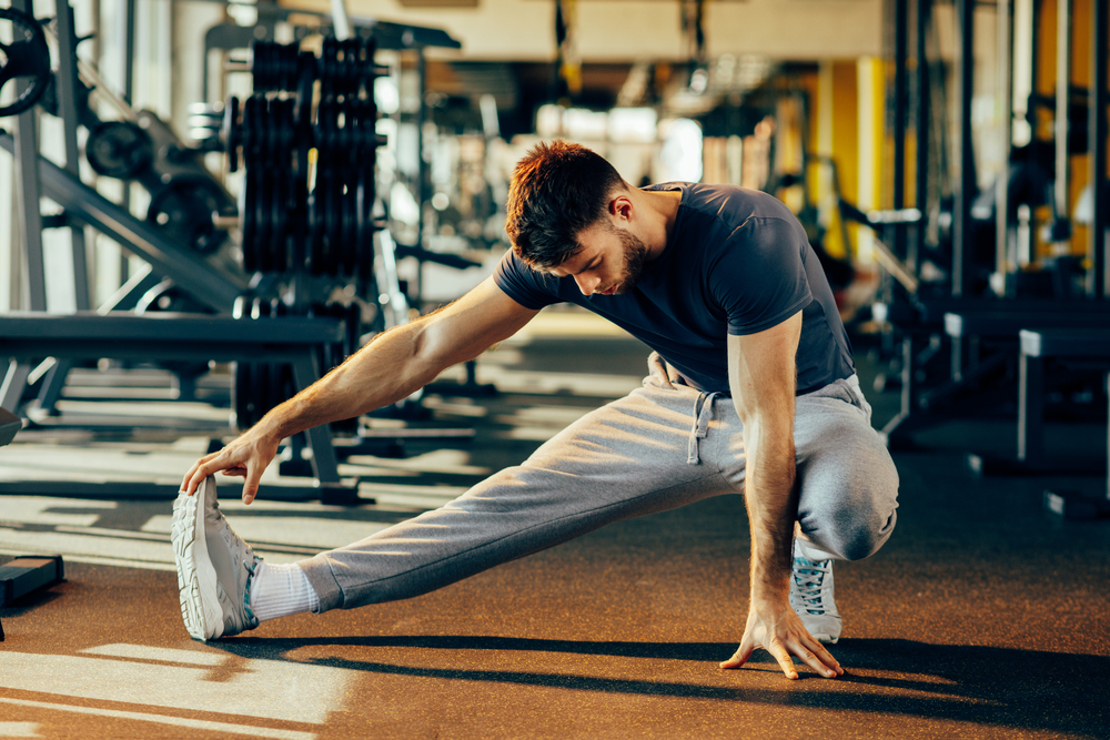 Stretch properly and get your warm ups done before hitting the equipment. (Shutterstock)