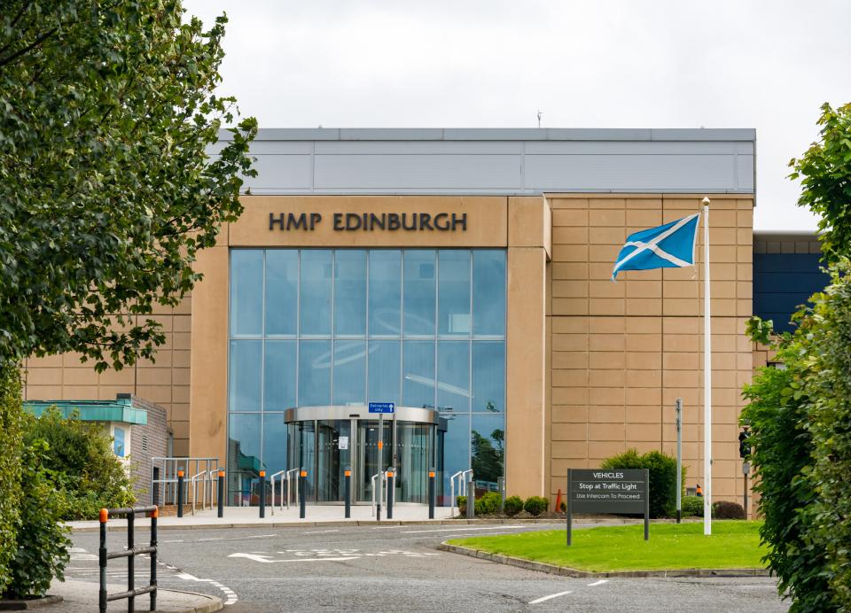 HMP Edinburgh entrance with Scottish flag.