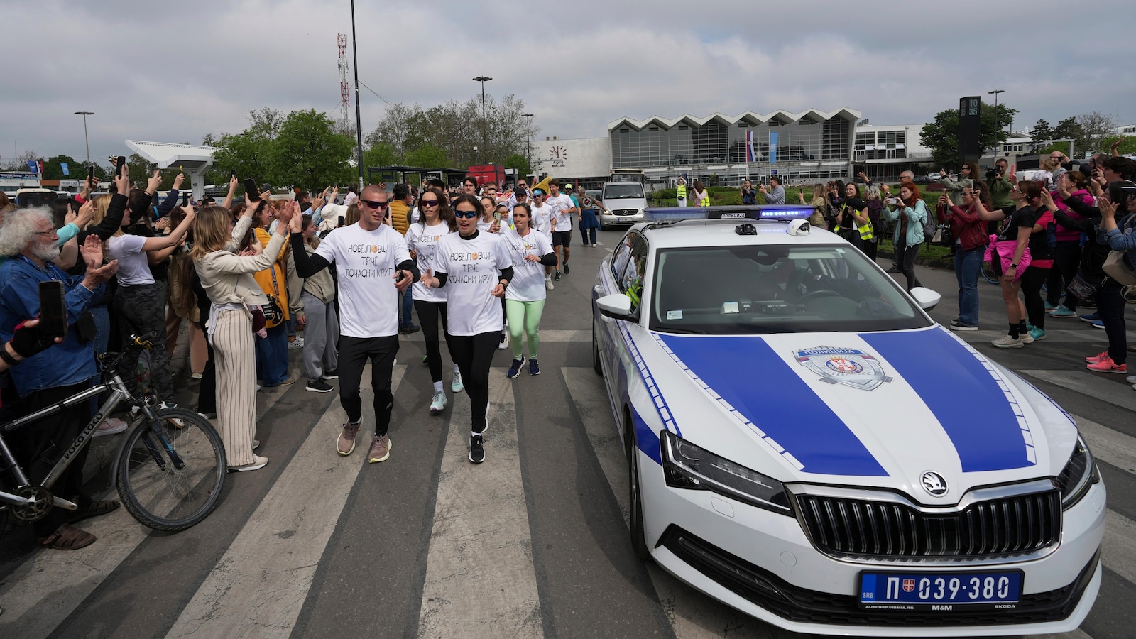 After cycling to France, Serbia's protesting students run to Brussels to stir EU attention