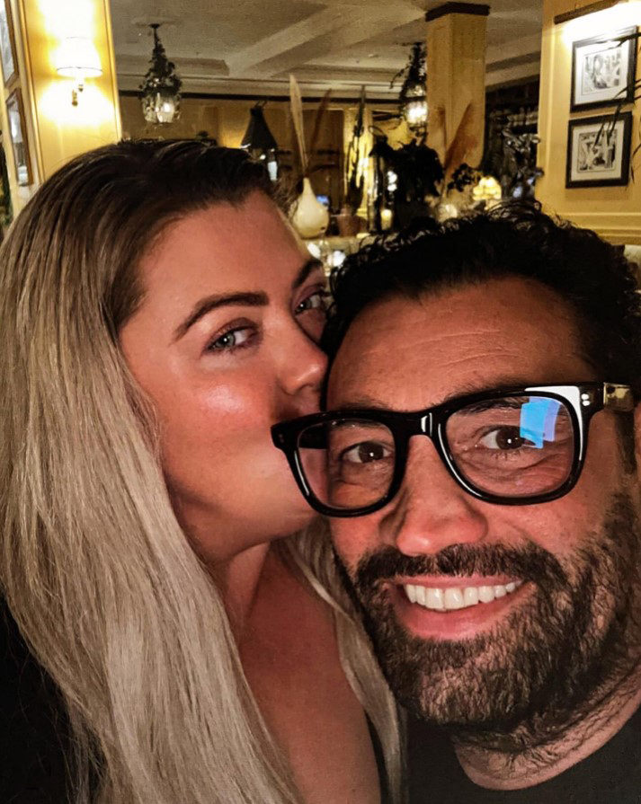 Gemma Collins kissing Rami on the cheek.