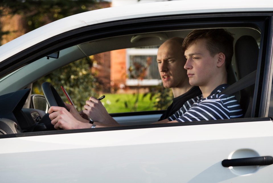 Teenage driver taking a driving lesson.