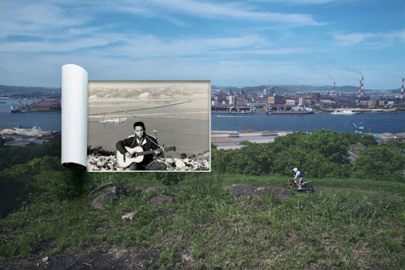 A modern cyclist rides up a grassy hill overlooking an industrial waterfront. A rolled-out black-and-white photo of a man playing guitar outdoors is superimposed over the scene, blending past and present.