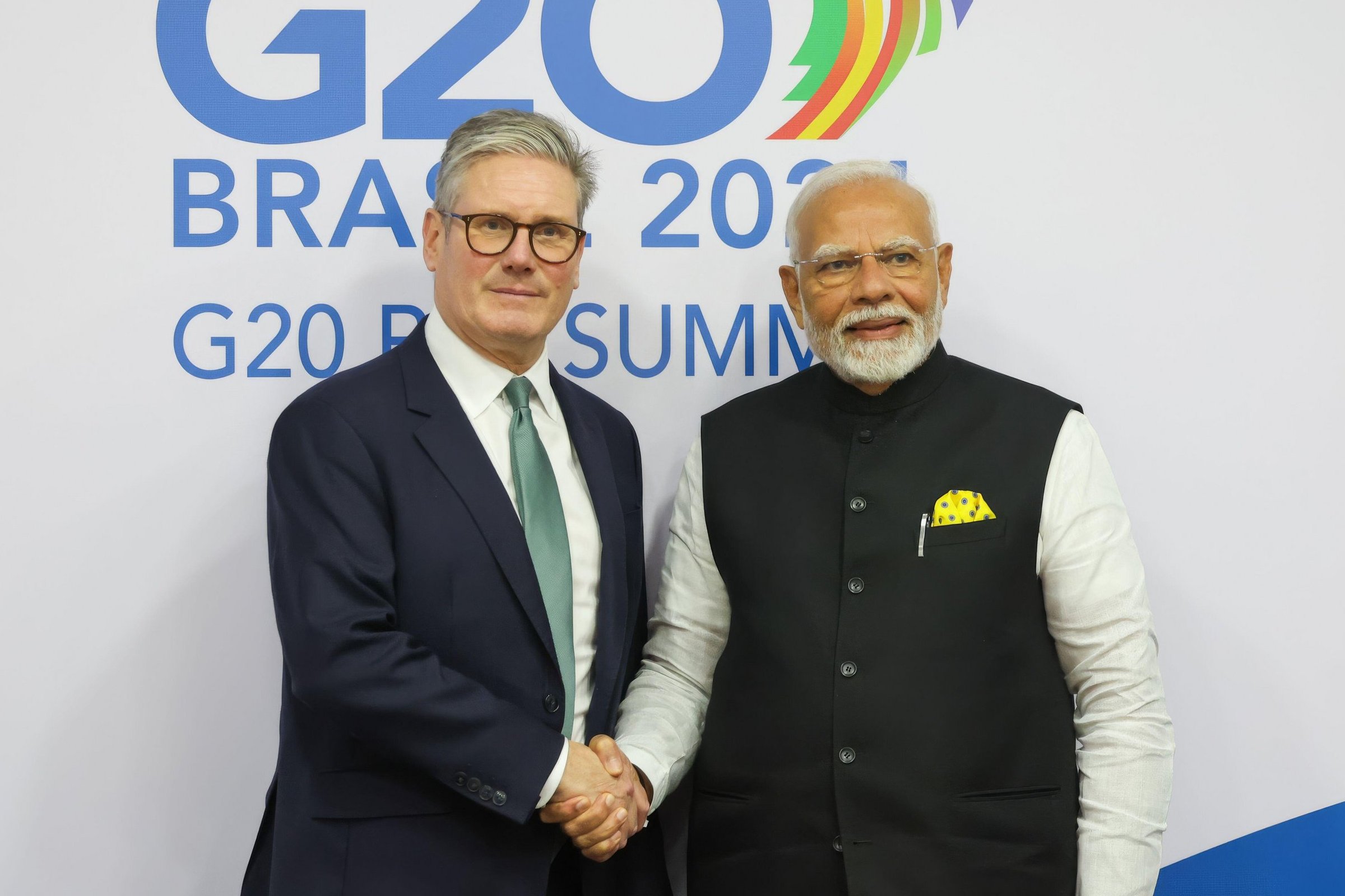 Narendra Modi and Keir Starmer shaking hands at the G20 summit.