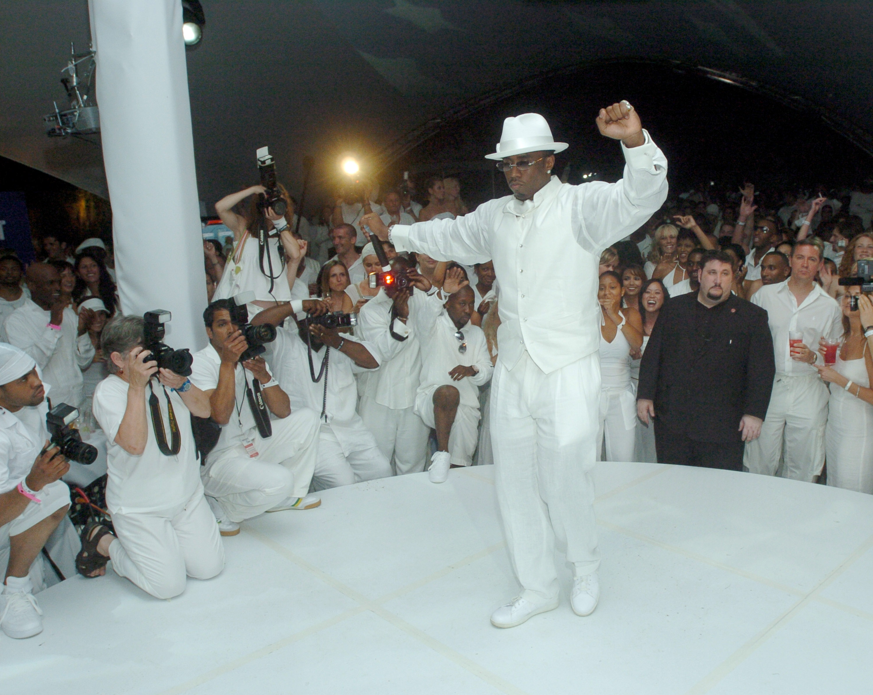 A “white party” hosted by Diddy — an event separate from the alleged “freak offs”. None of the people pictured have been implicated in the accusations of abuse