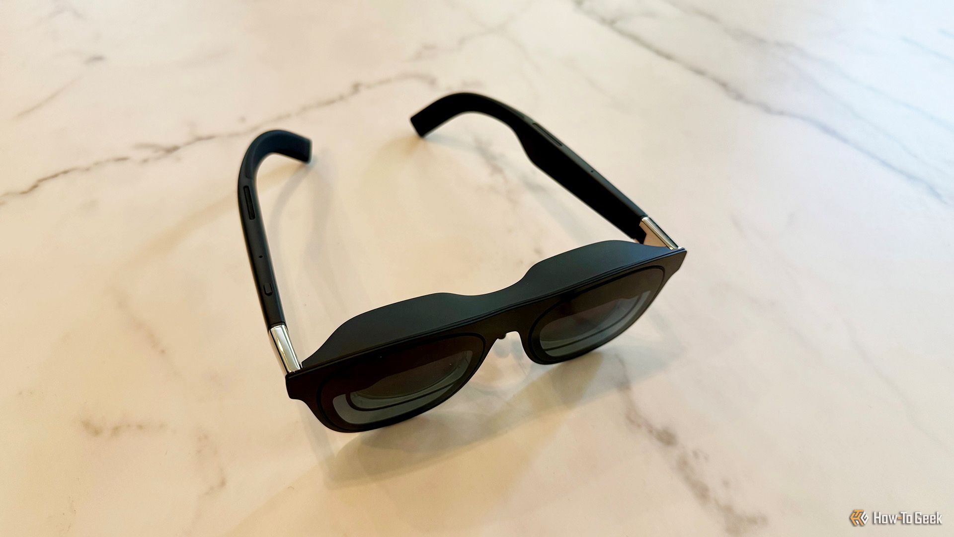 XREAL One AR Glasses on a table.