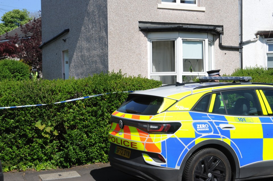 Police car at a murder scene.