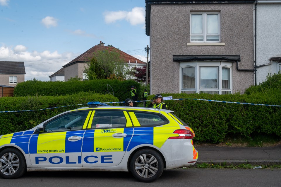 Police car at a crime scene.