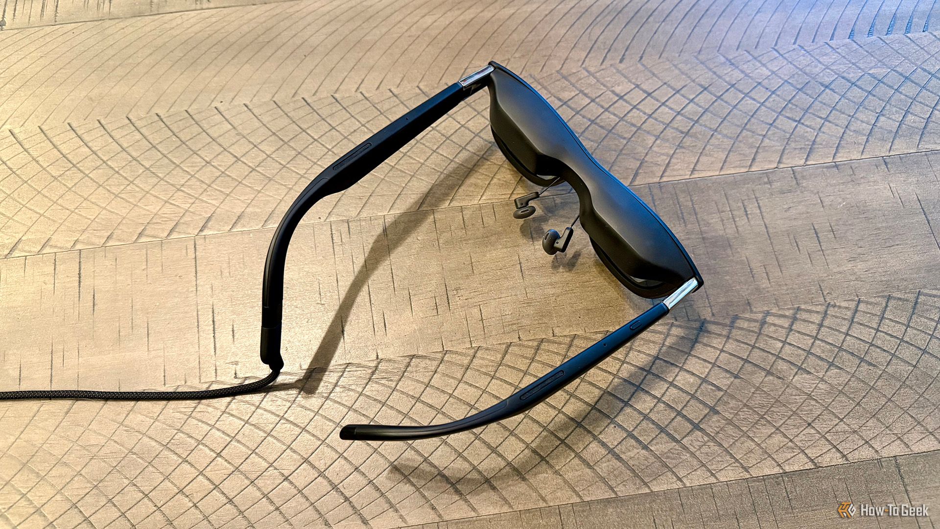 Angled overhead view of the XREAL One AR Glasses on a table.