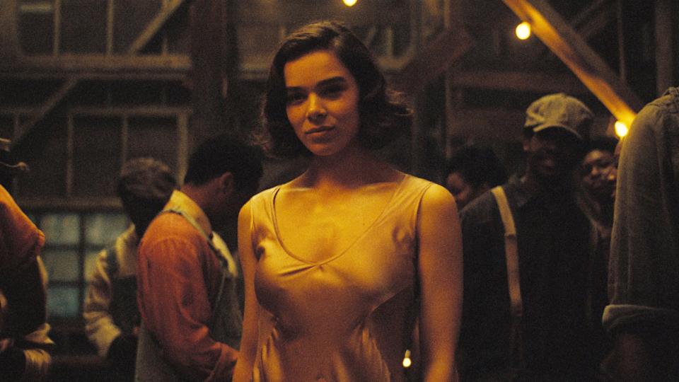 Hailee Steinfeld wears a satin dress at a 1930s gathering in a still from 'Sinners'.