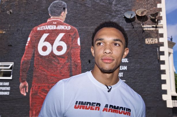Trent Alexander-Arnold in front the mural on Sybil Road.