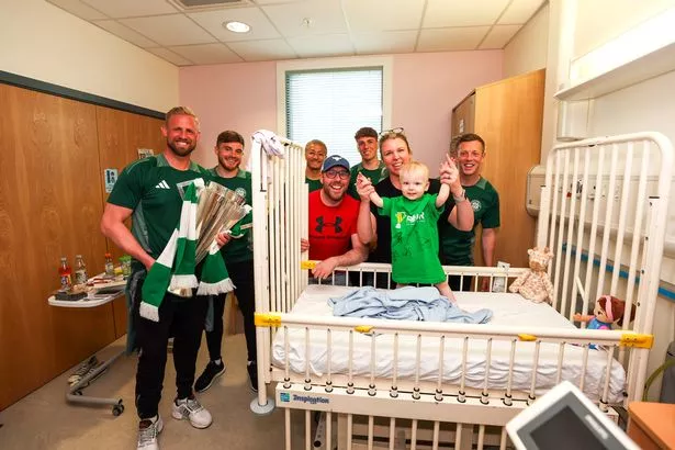 Phoebe Griffin, 2, with the Celtic stars