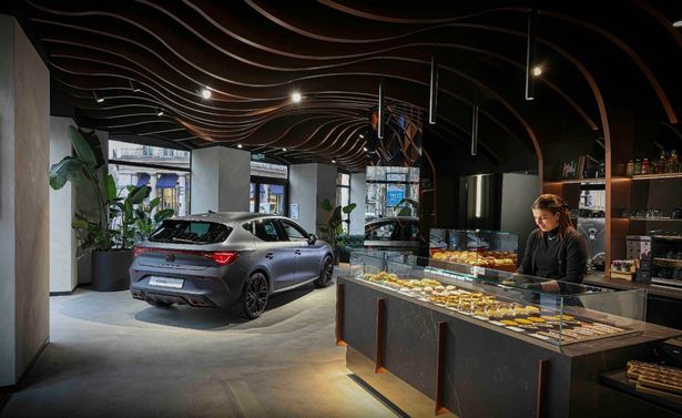 The CUPRA City Garage in Paris features its own cafe, whilst others include cocktail bars