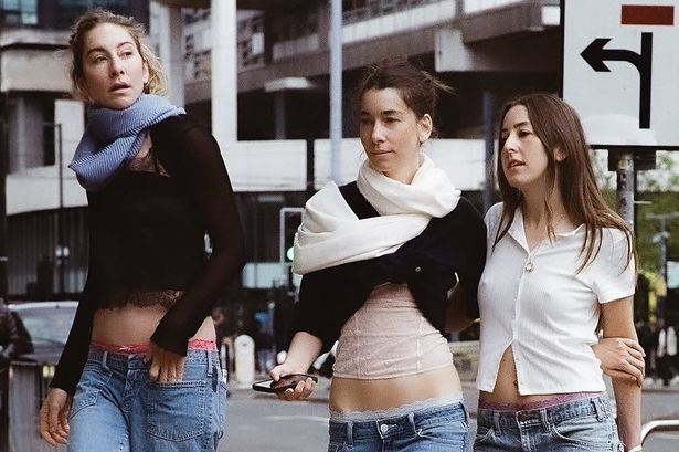 Haim have taken to Manchester for the artwork for their latest single Take Me Back