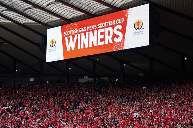 Aberdeen fans celebrate in the stands after the Scottish Gas Men's Scottish Cup final at Hampden Park